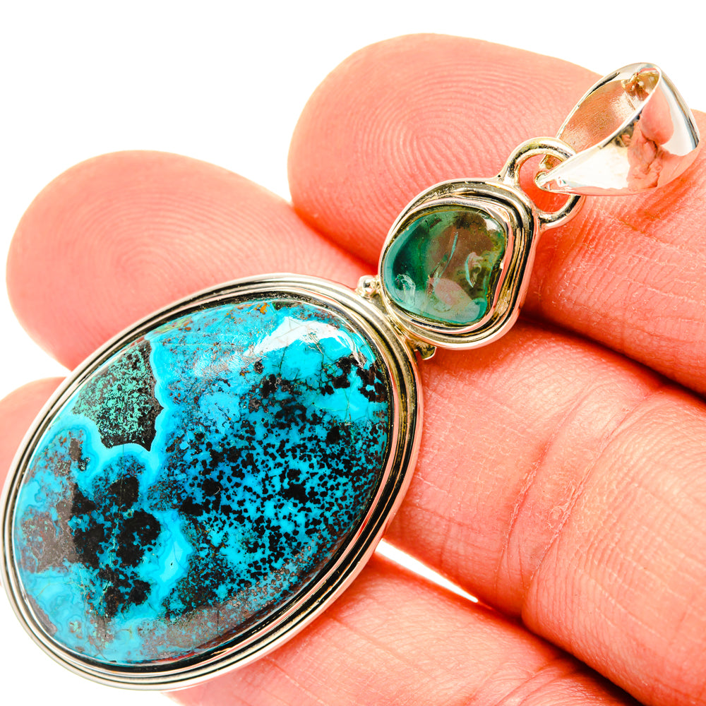 Oval turquoise stone pendant with small green stone, set in 925 sterling silver