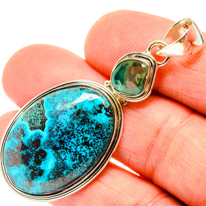 Oval turquoise stone pendant with small green stone, set in 925 sterling silver