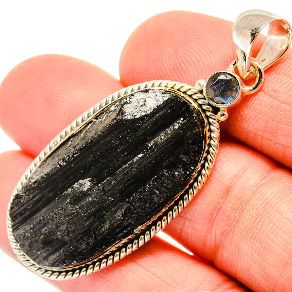 Oval black tourmaline pendant in 925 silver with blue labradorite accent