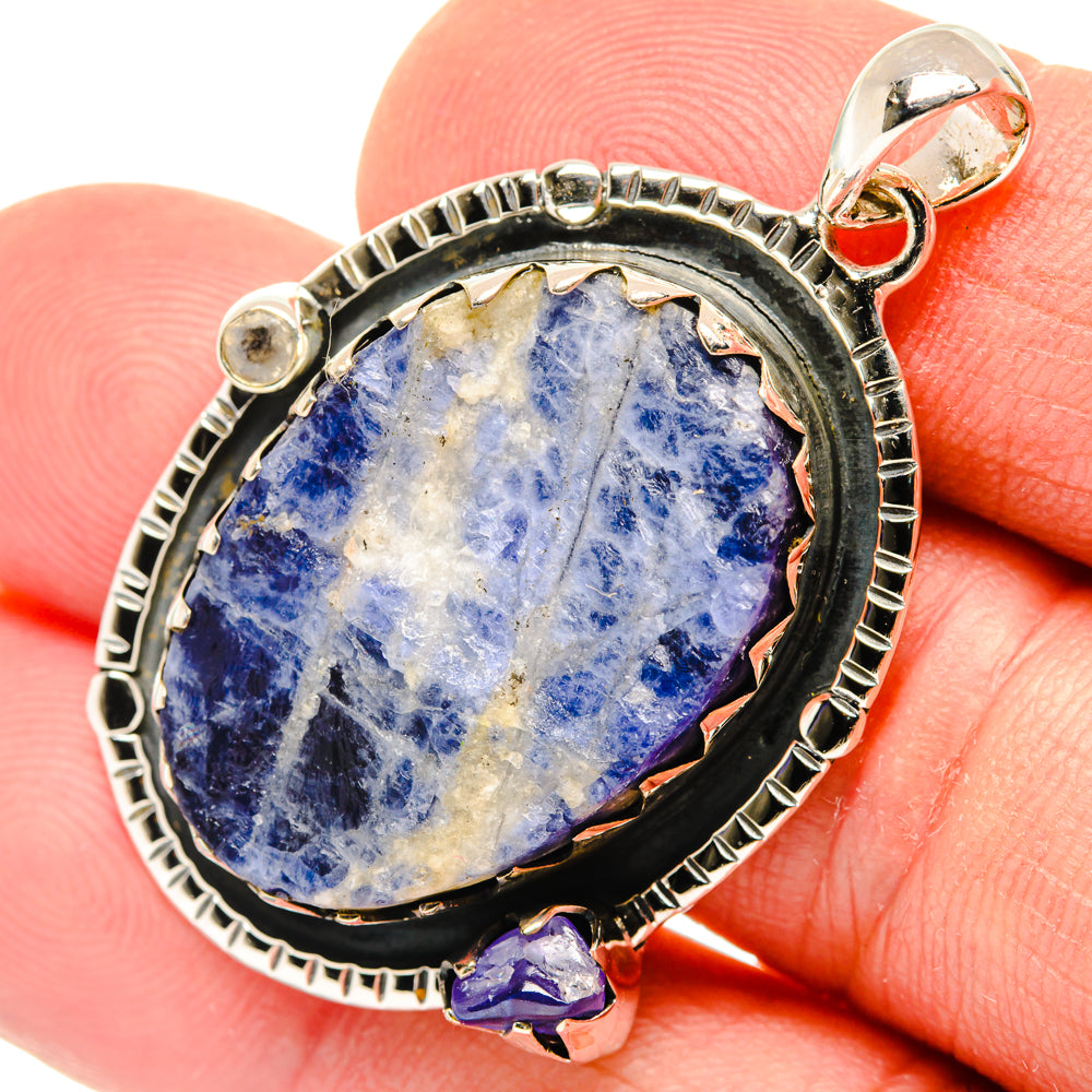 Rough sodalite drop pendant in sterling silver with small moonstone accents