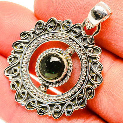 Sterling silver pendant with round green aventurine cabochon and ornate filigree frame