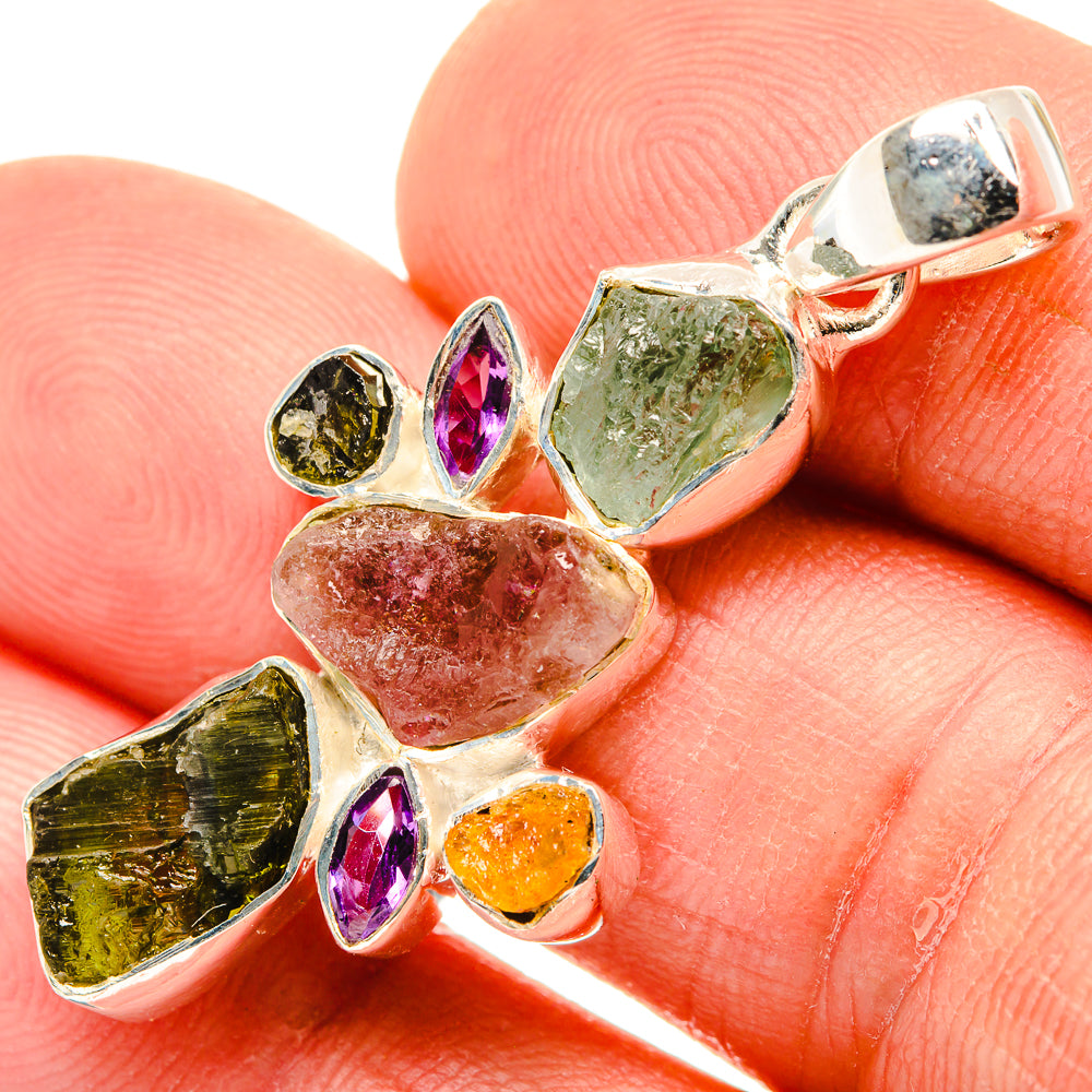 Multicolor gemstone pendant in polished 925 silver with rough green, purple and yellow stones