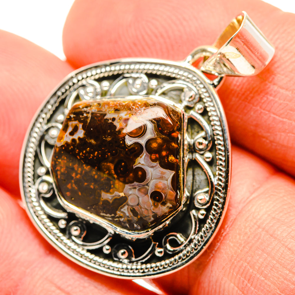 Mexican fire agate pendant in ornate 925 sterling silver bezel, amber-brown stone
