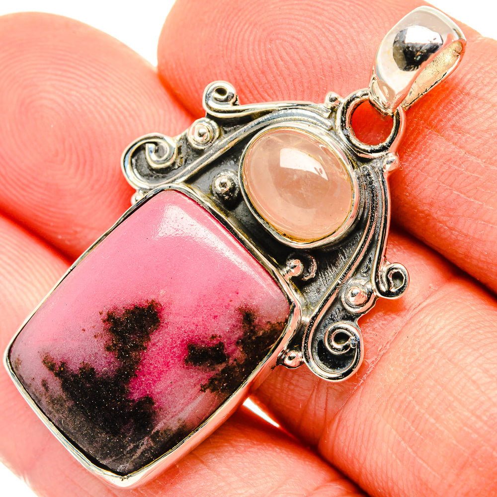 Close-up sterling silver pendant with pink rhodonite, peach rose quartz and bail loop