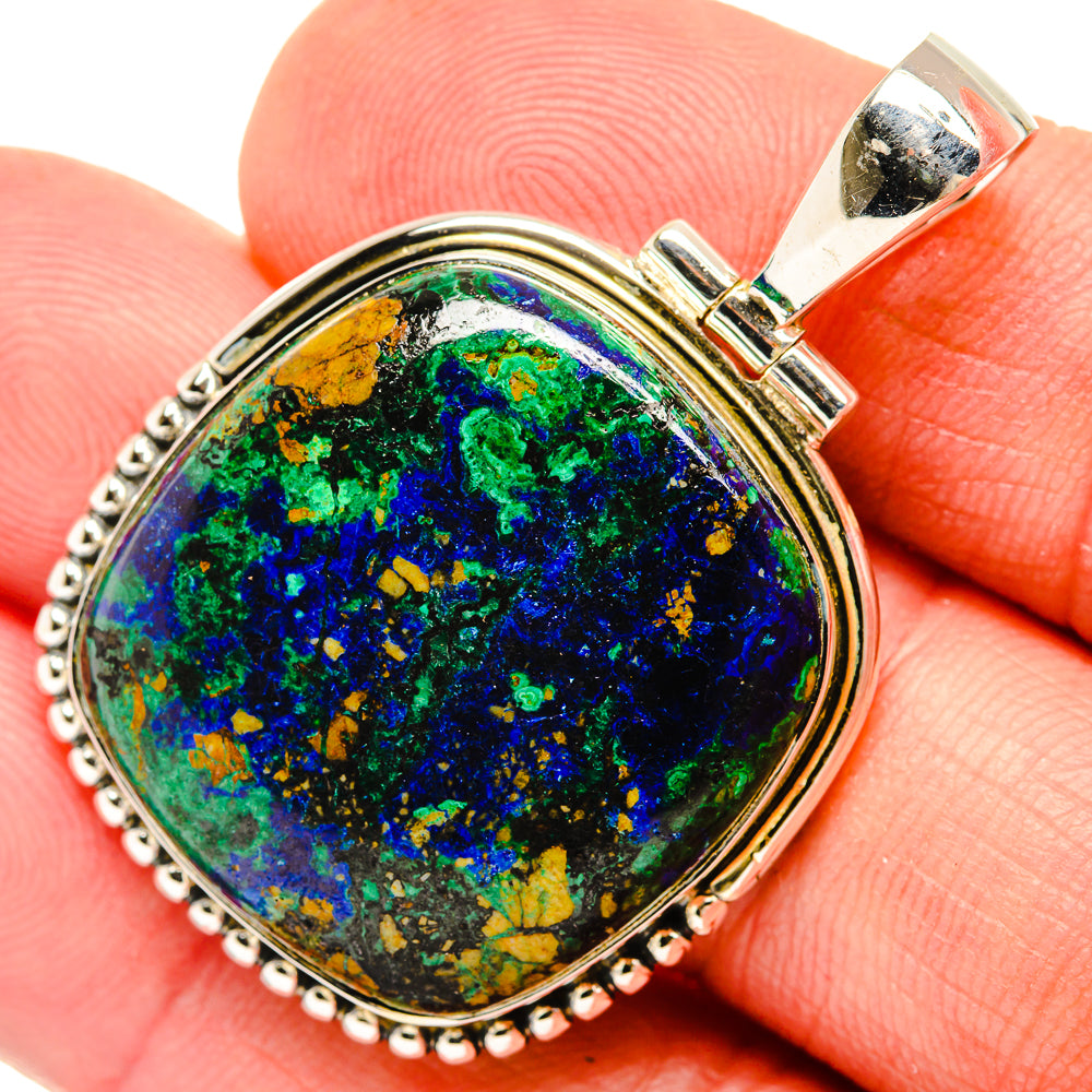 925 sterling silver oval azurite pendant, round bail, beaded edge, blue-green speckled cabochon.