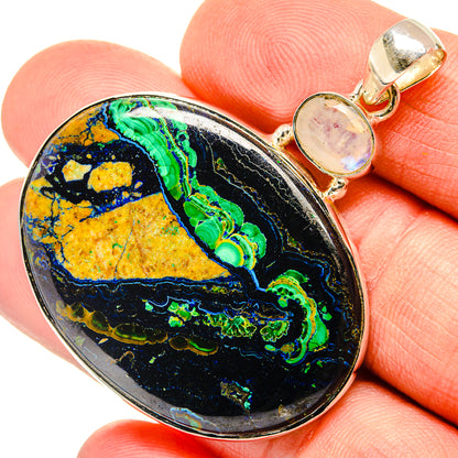 Oval multicolor cabochon pendant with rainbow-like bands and sterling silver bail