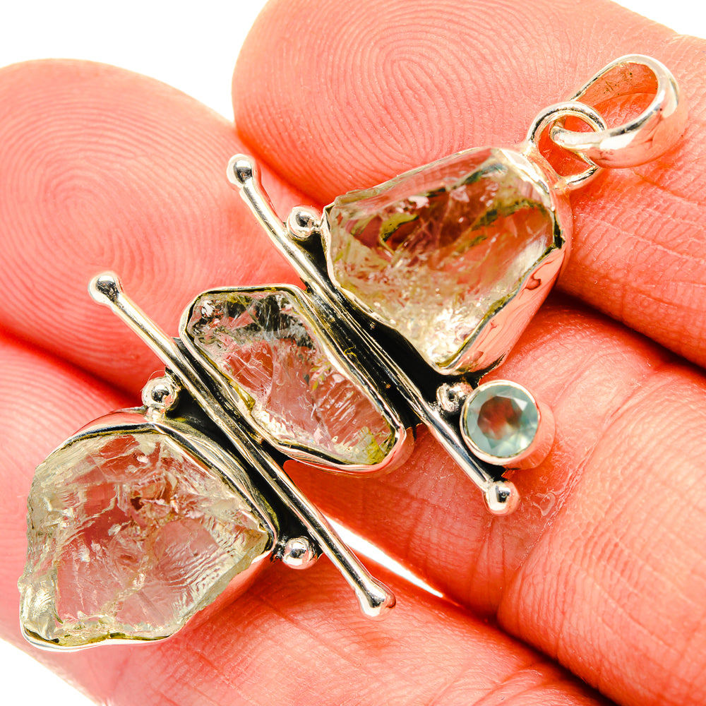 Rough gemstone pendant in 925 sterling silver with prong-set orange quartz and green round accent