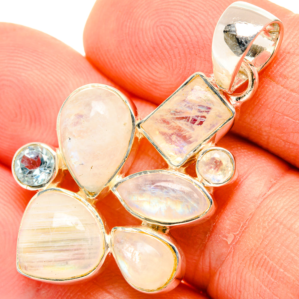 Moonstone heart pendant close-up with blue topaz round accent, 925 sterling silver