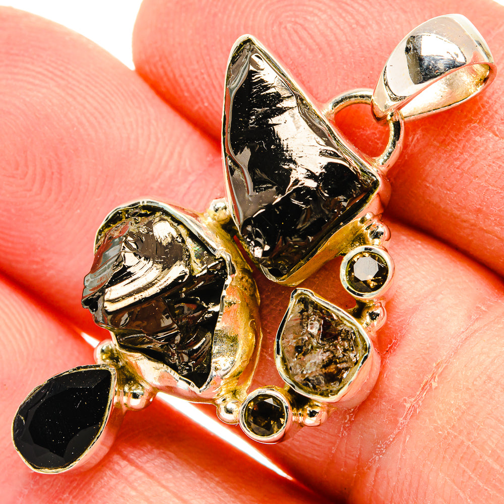 Gold-tone 925 sterling silver pendant with rough dark and clear gemstone pieces