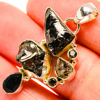 Gold-tone 925 sterling silver pendant with rough dark and clear gemstone pieces