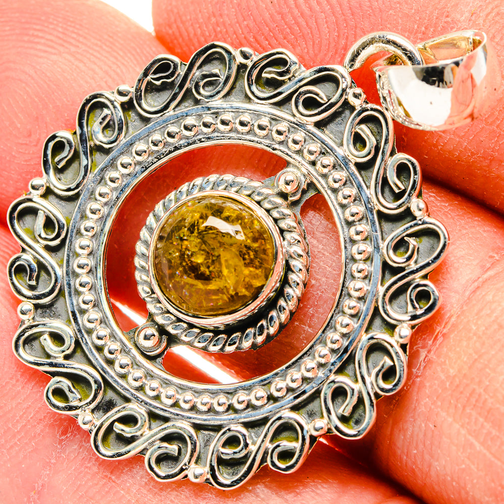Citrine stone detail in silver bezel with scrollwork border pendant