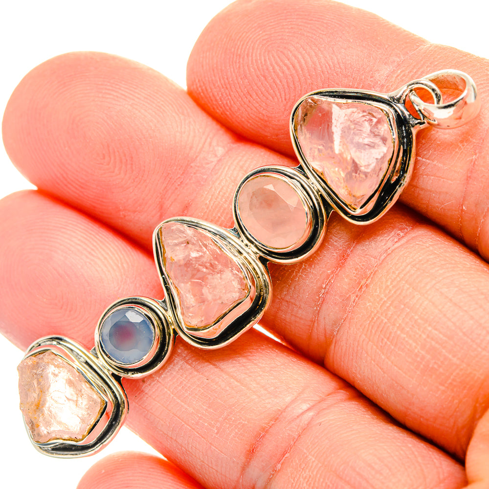 925 sterling silver heart pendant with rough pink stones and blue cabochon
