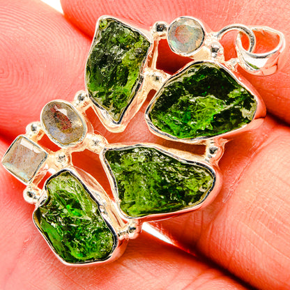 Sterling silver pendant with rough green diopside stones and round opalescent labradorite