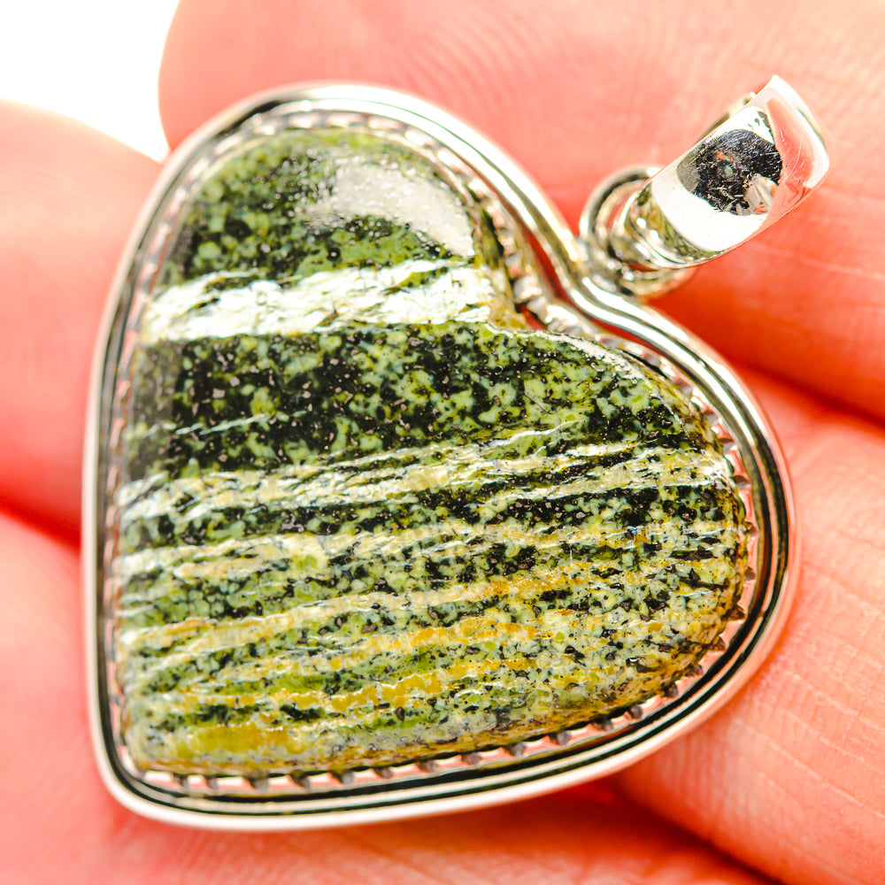 Green Swiss opal heart pendant in polished 925 sterling silver bezel