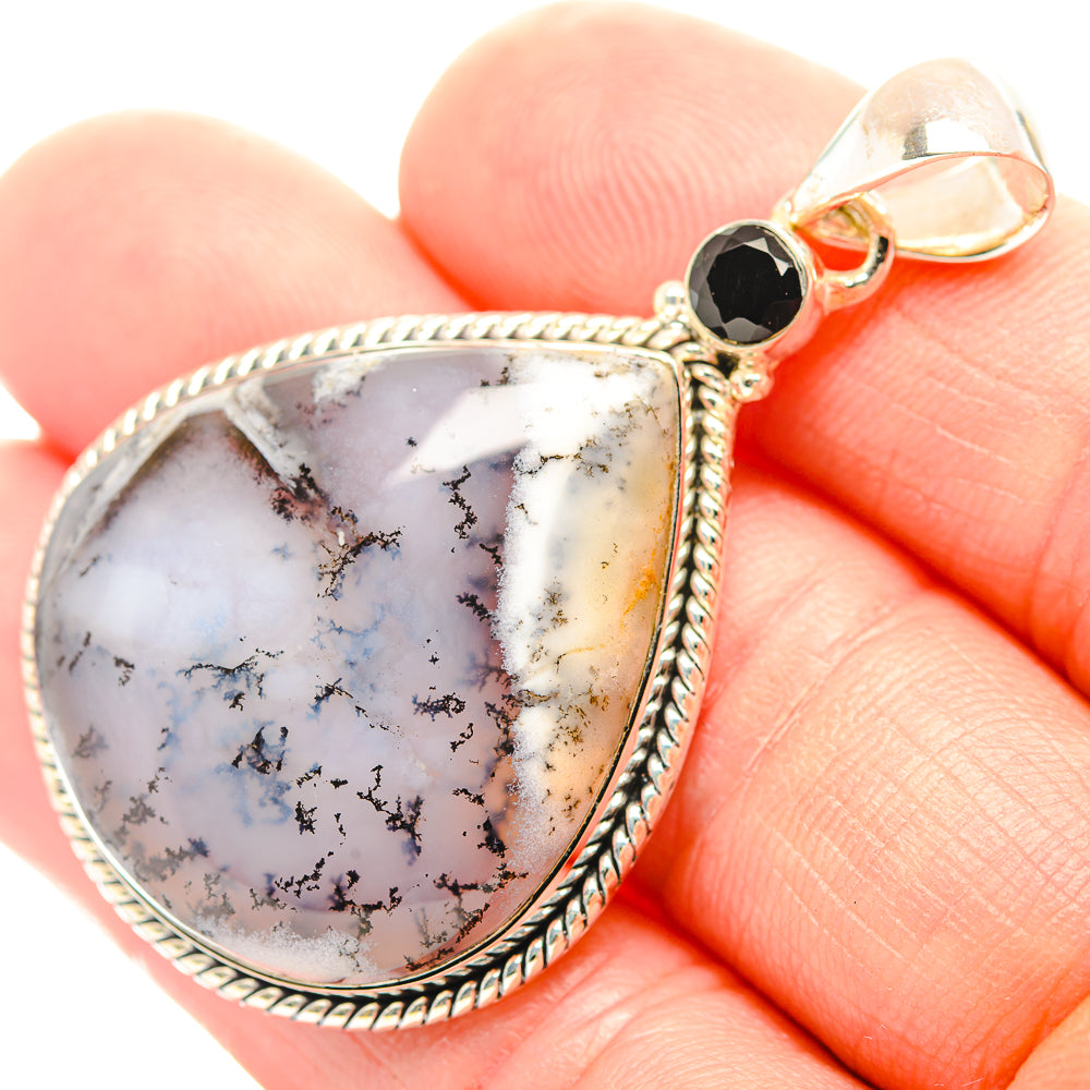 Sterling silver dendritic opal teardrop pendant with black onyx round accent at top