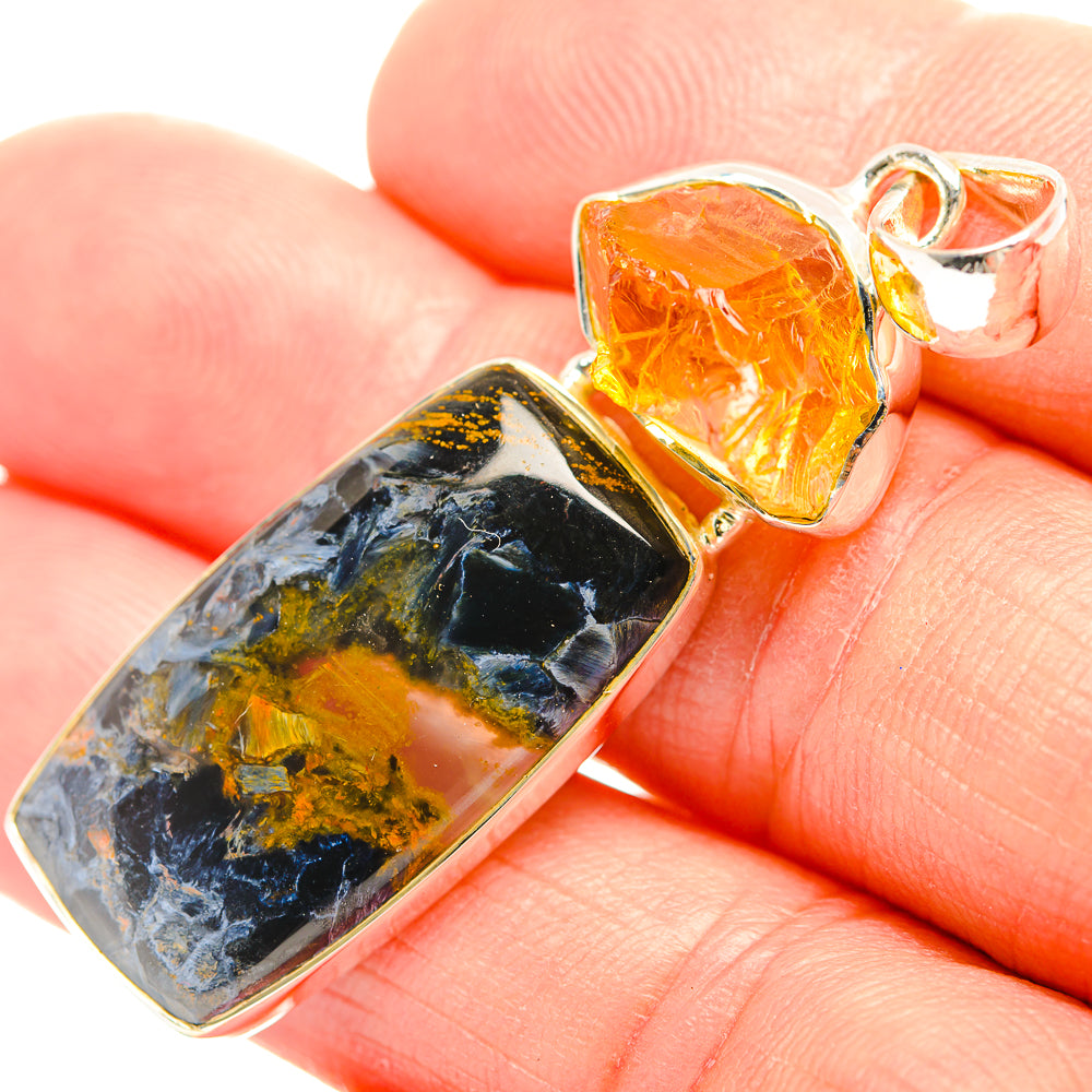 Sterling silver pendant with dark pietersite and orange citrine gemstone in bezel