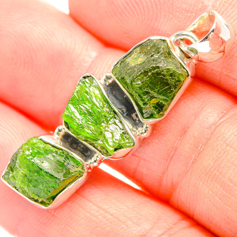 Rough green diopside pendant in 925 silver bezel with jump ring, close-up