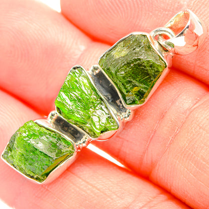 Rough green diopside pendant in 925 silver bezel with jump ring, close-up