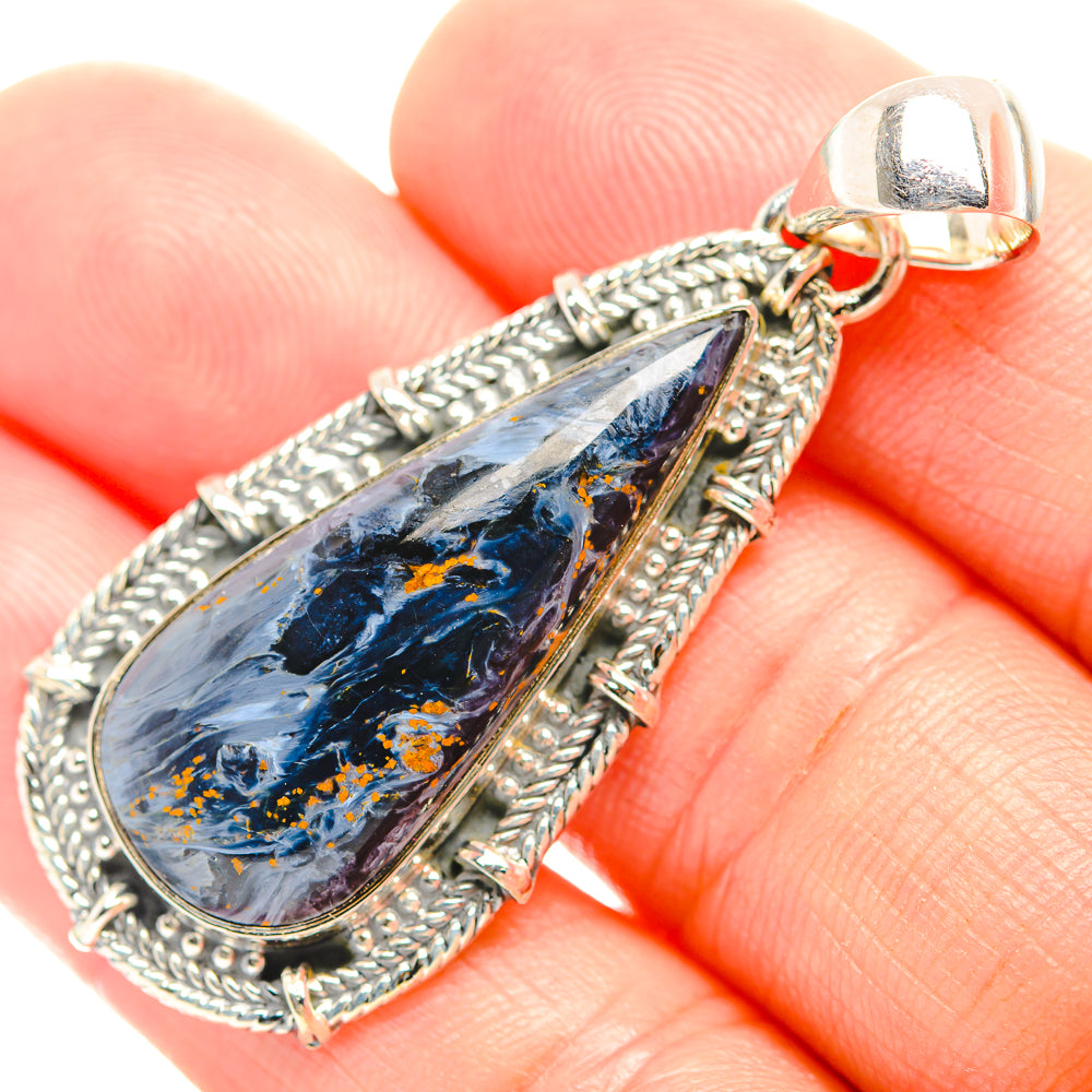 925 sterling silver pietersite pendant with blue teardrop stone, orange flecks, rope frame