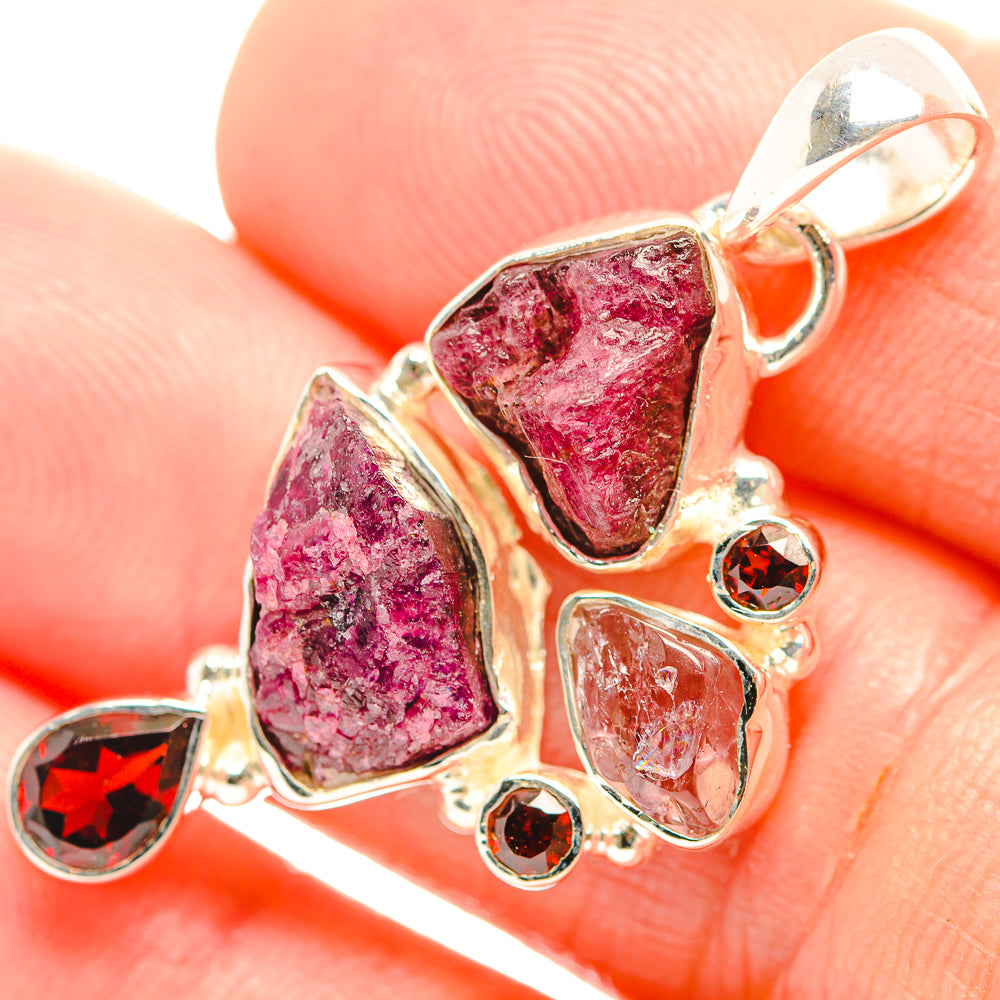 925 sterling silver pendant with rough pink tourmaline and red garnet accents