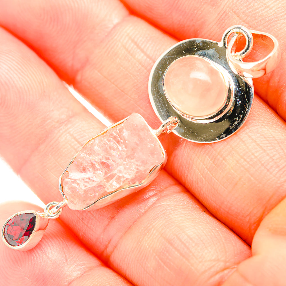 Sterling silver pendant with round peach rose quartz, rough pink stone, red garnet drop