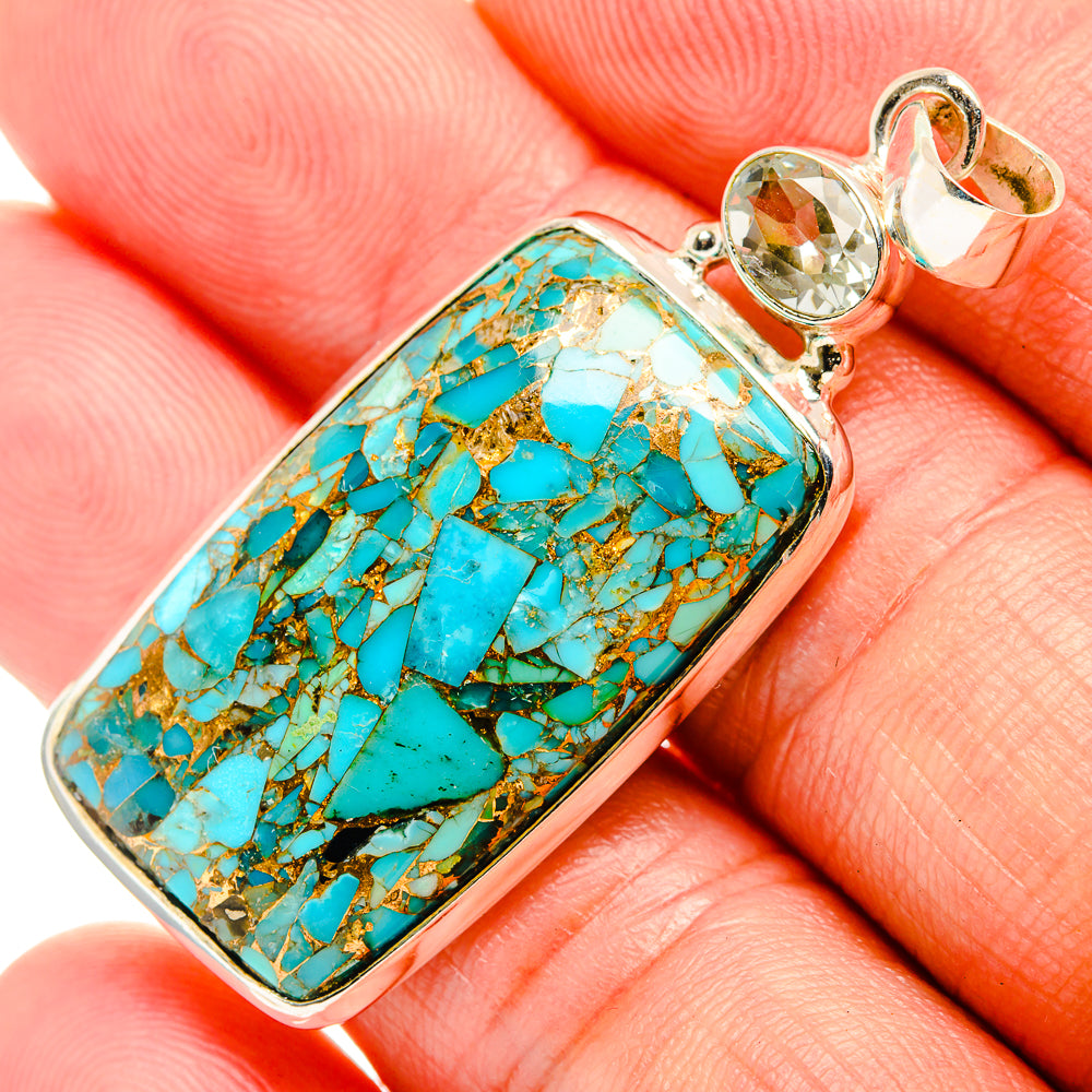 Turquoise rectangular pendant with sterling silver frame and round crystal details
