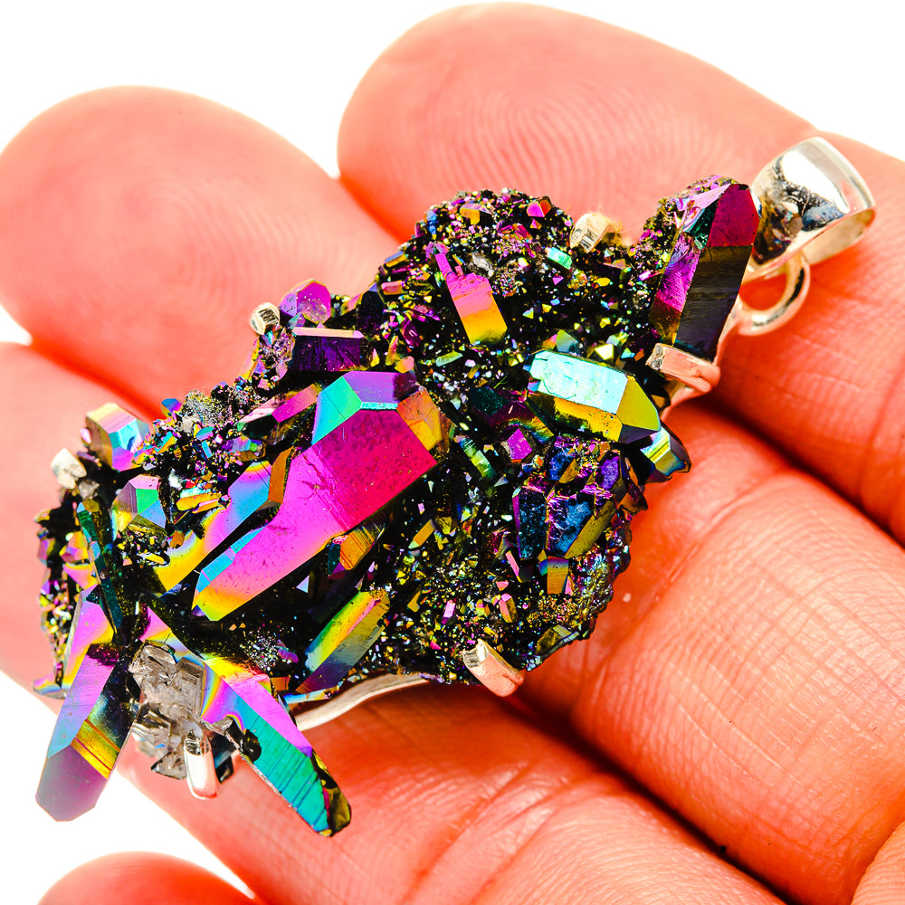 Rainbow druzy pendant close-up on silver bail, multicolor iridescent crystal shards
