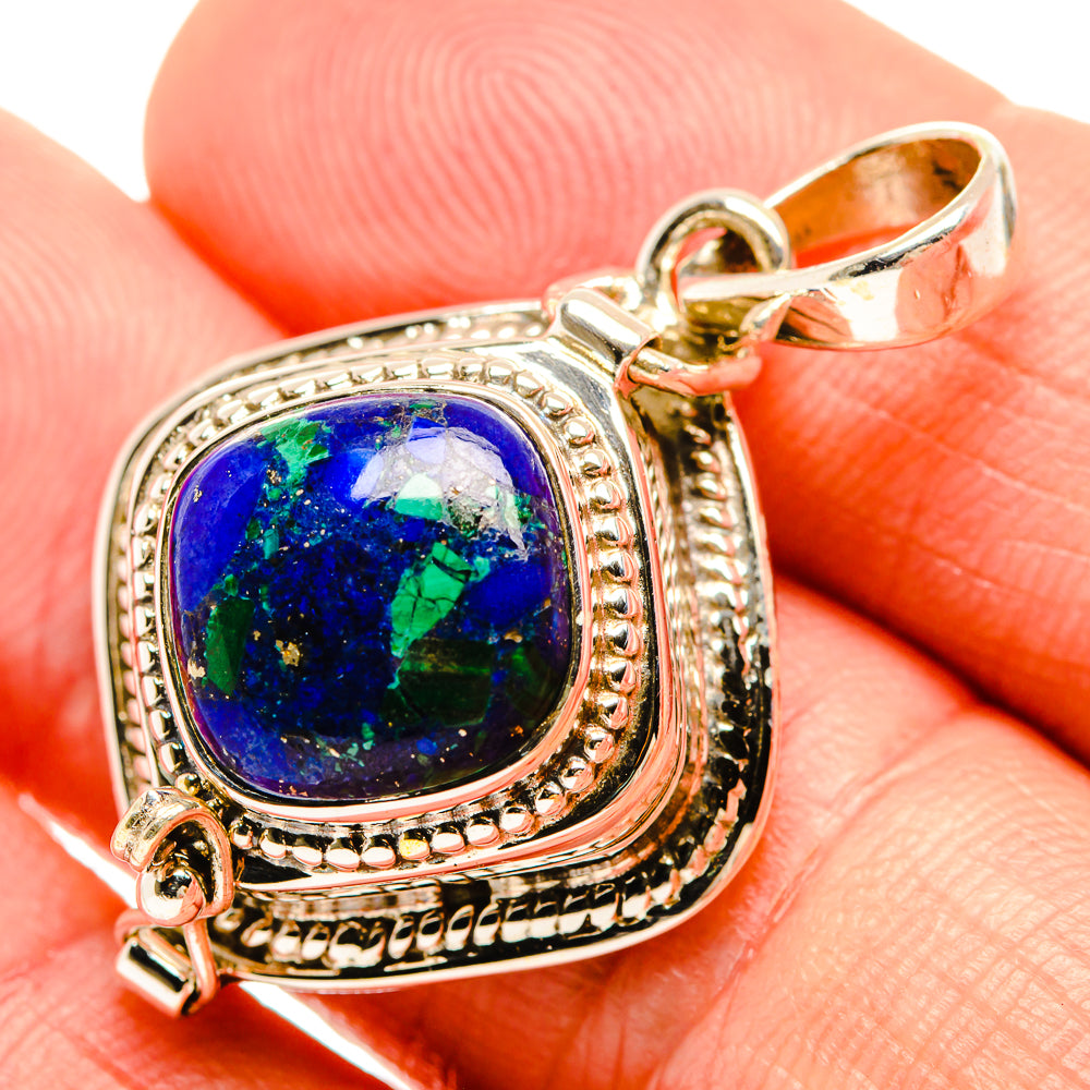 Sterling silver lapis lazuli pendant with oval blue gemstone and side dangling detail