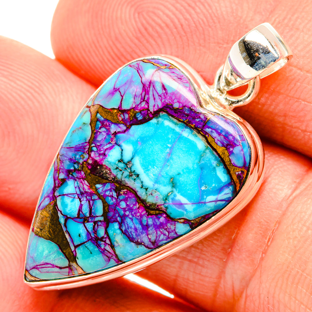 Heart-shaped turquoise, purple and copper composite pendant in sterling silver bezel