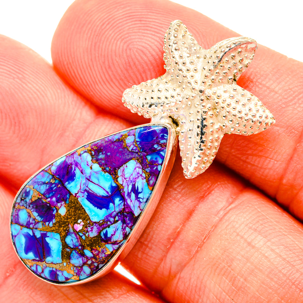 Sterling silver starfish pendant with teardrop purple-blue gemstone