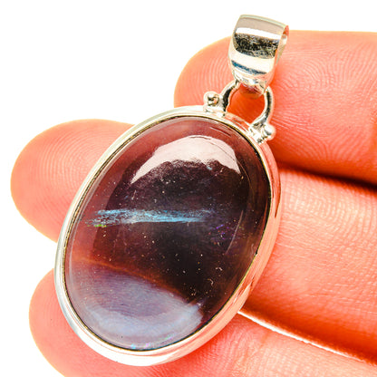 Oval fluorite pendant in 925 sterling silver with iridescent blue accents