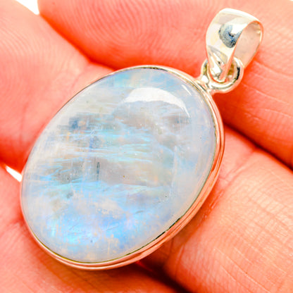 925 sterling silver moonstone pendant close-up, oval opal-like blue stone with bail