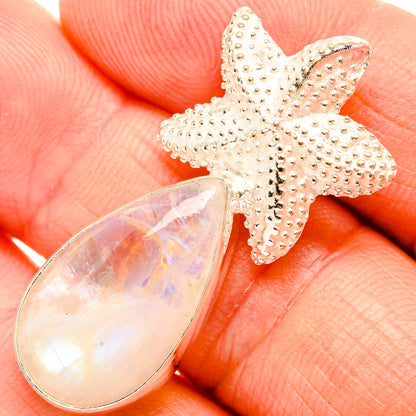 Close-up of moonstone teardrop starfish pendant with 925 sterling silver textured details