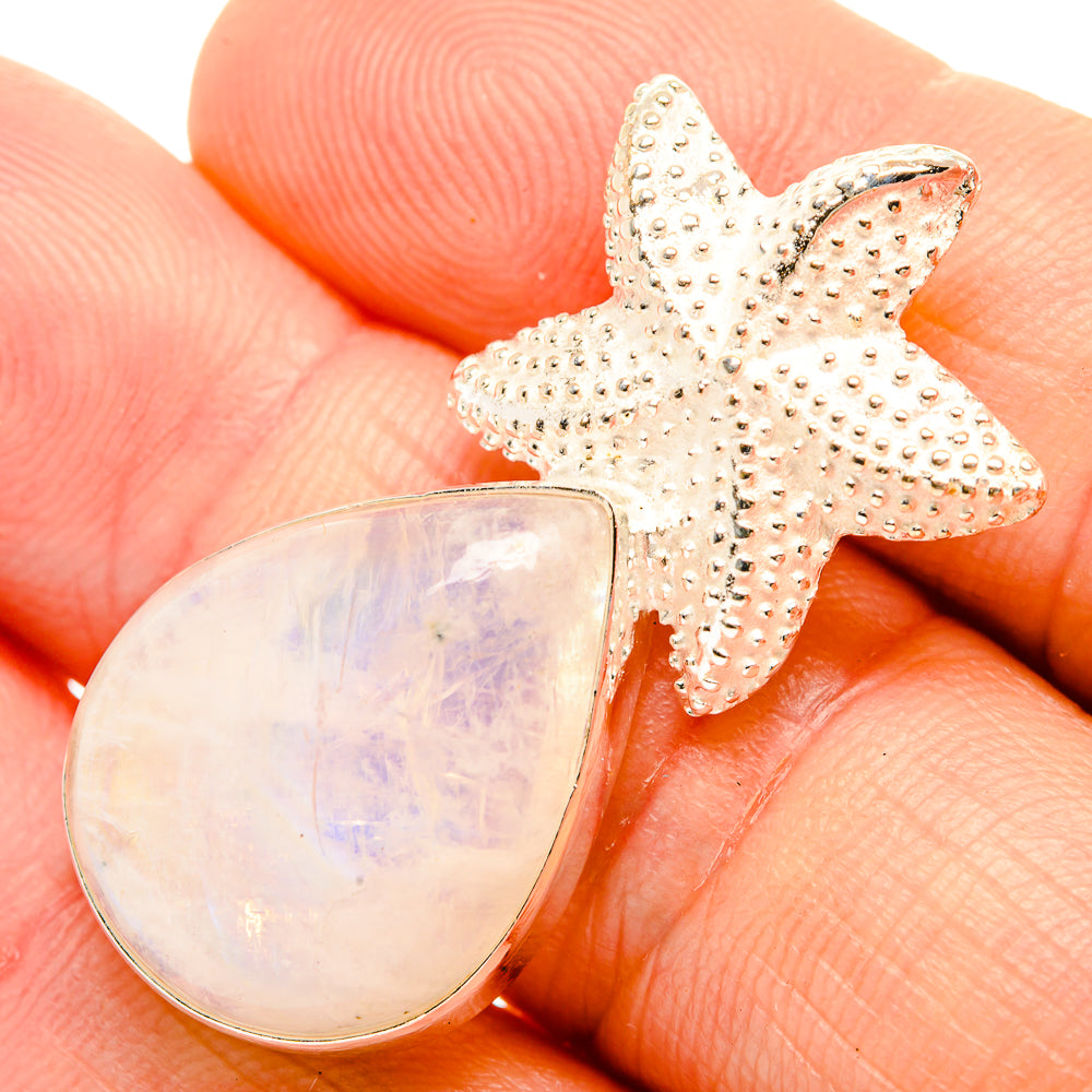 Moonstone pendant with teardrop opal cabochon and silver starfish charm