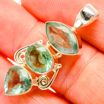 Green fluorite teardrop pendant in 925 sterling silver setting, three stones visible