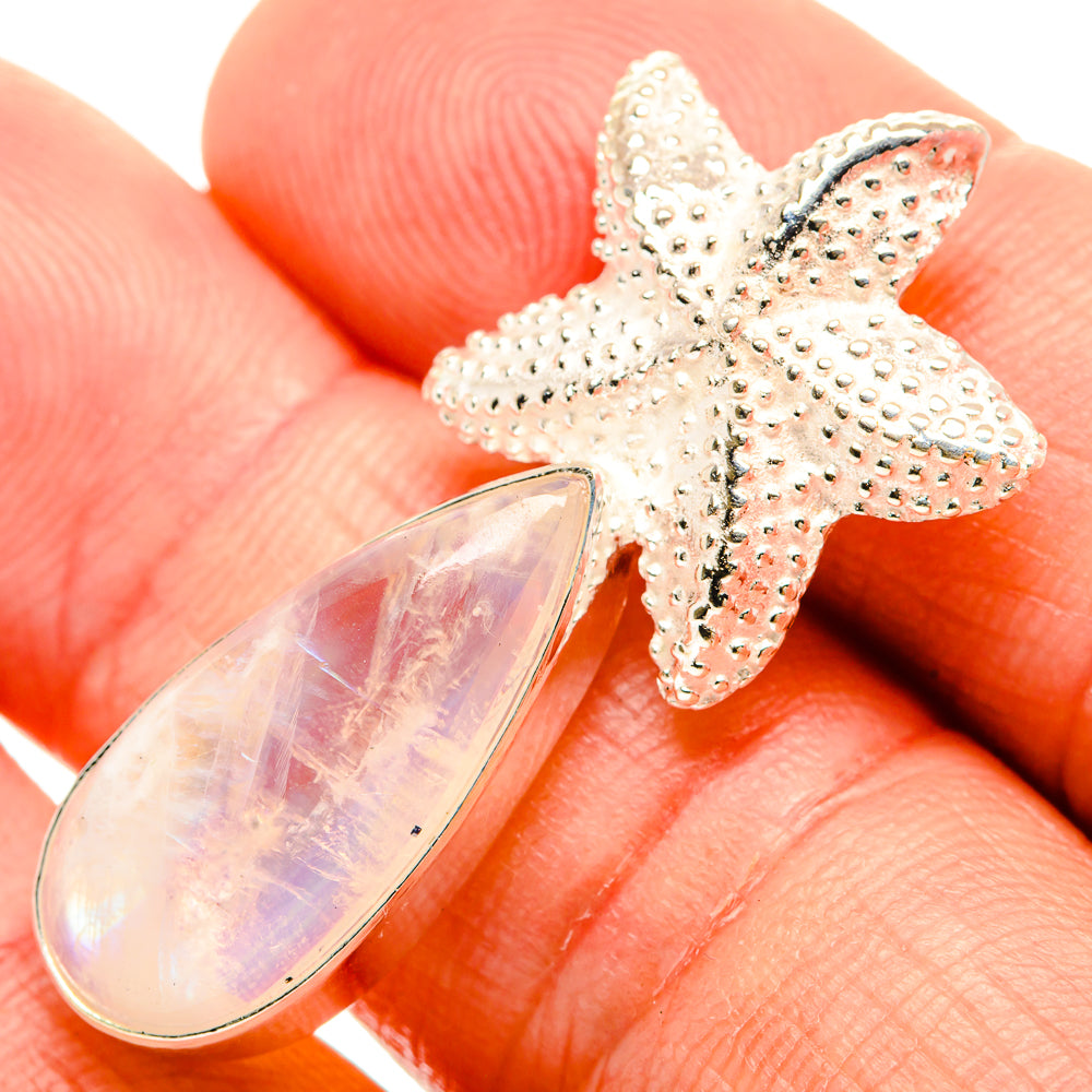 Sterling silver starfish pendant with teardrop opalescent moonstone cabochon
