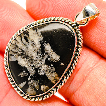 Black and white druzy teardrop pendant with rope border and 925 sterling silver bail