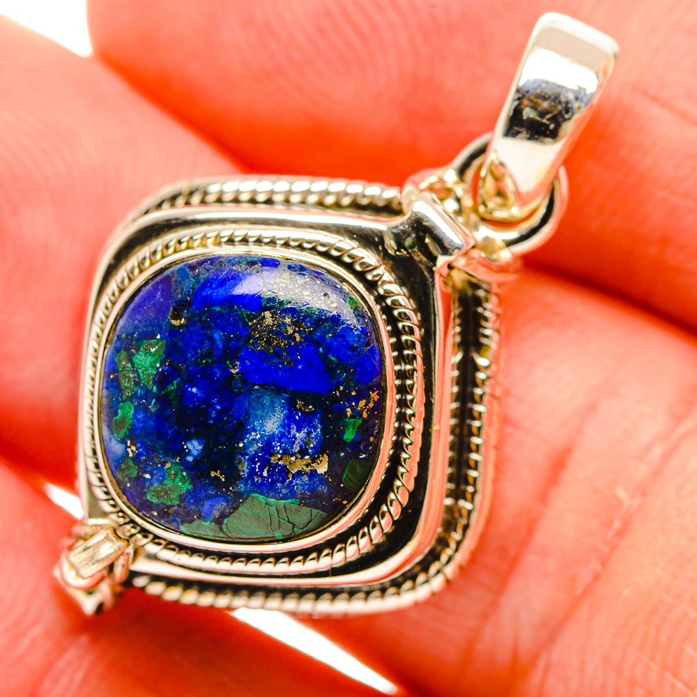 Oval lapis lazuli pendant detail in 925 sterling silver, blue stone in textured bezel
