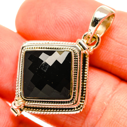 Close-up square black onyx pendant with patterned stone, 925 sterling silver frame and bail