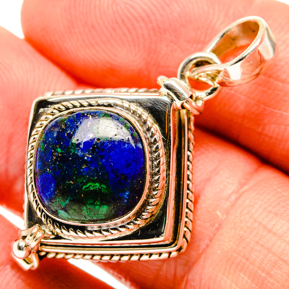 Sterling silver lapis lazuli pendant close-up with oval blue-green stone and bail