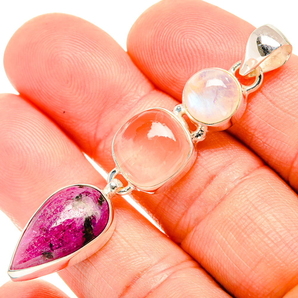 Sterling silver gemstone pendant with teardrop purple, oval pink, and round white stones