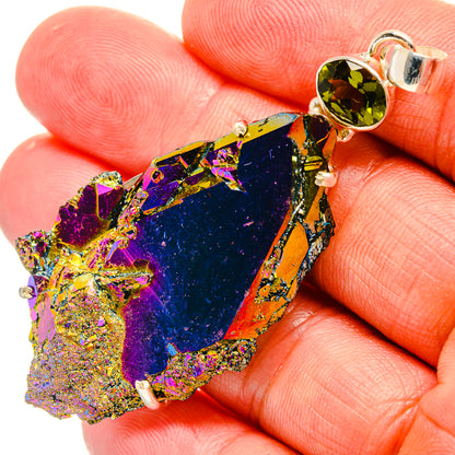 Blue/purple druzy pendant with green round peridot accent and silver bail