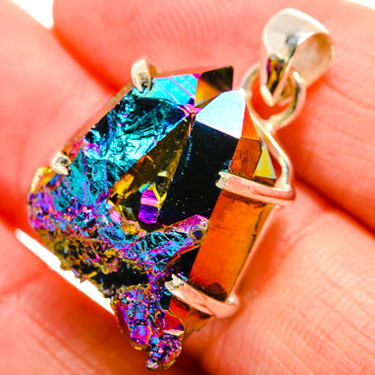 Close-up iridescent druzy pendant with silver bail and prongs, blue purple gold tones