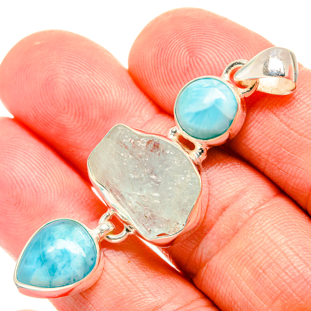 Larimar aquamarine pendant, rough center stone with round blue side stones in silver