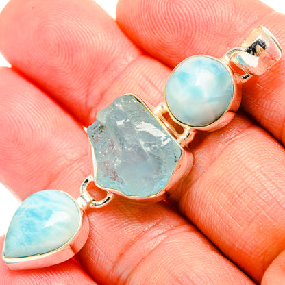 Larimar and rough aquamarine pendant with two round stones and metal setting