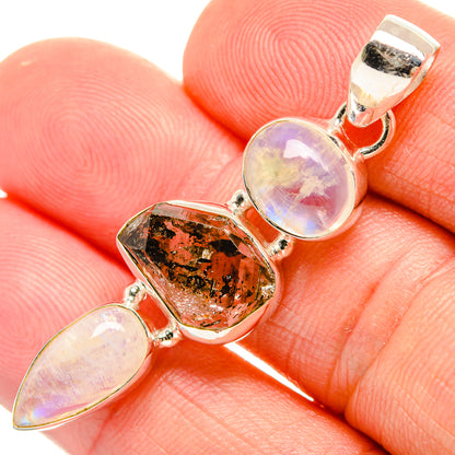 Sterling silver gemstone pendant with opalescent moonstone and dark herkimer crystal