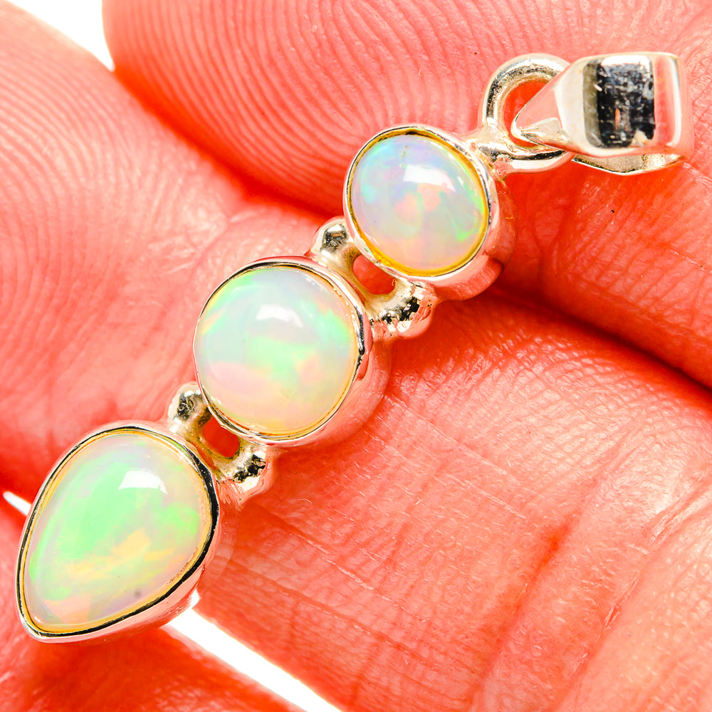 Ethiopian opal pendant close-up, 925 silver with three rounded and teardrop opals