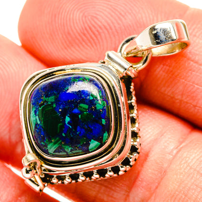 Sterling silver azurite pendant with blue-green cabochon and scalloped frame