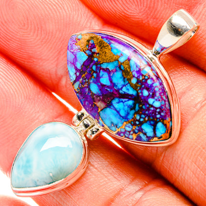 Teardrop sterling silver pendant close-up with purple turquoise and light blue larimar