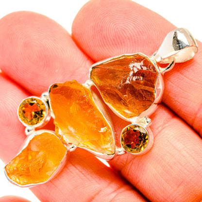 Rough carnelian pendant with three amber stones, two round orange accents, 925 silver
